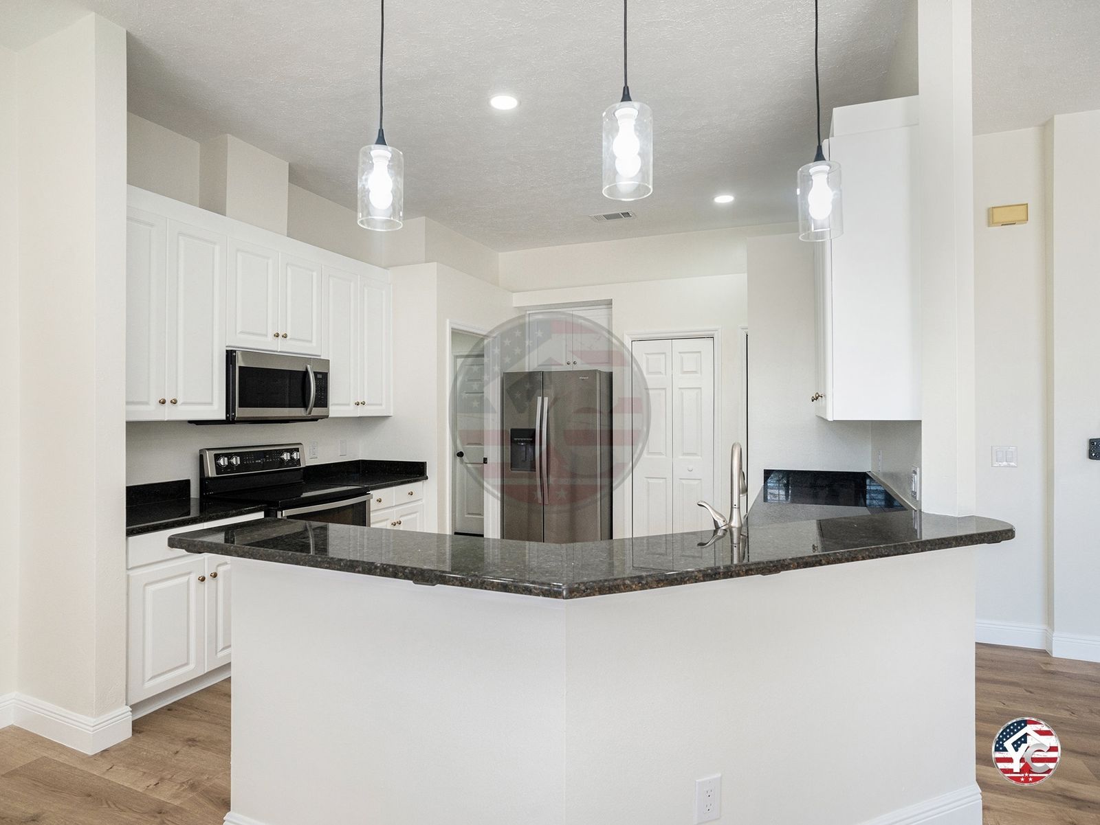 Remodeled Kitchen with White Cabinetry