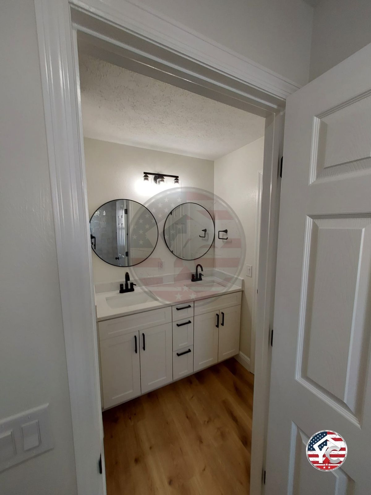 Powder room with double round mirrors