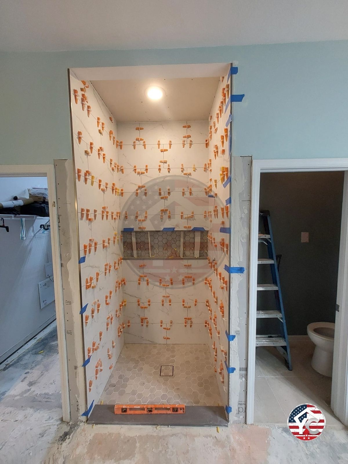 Shower tile installation with built-in niche